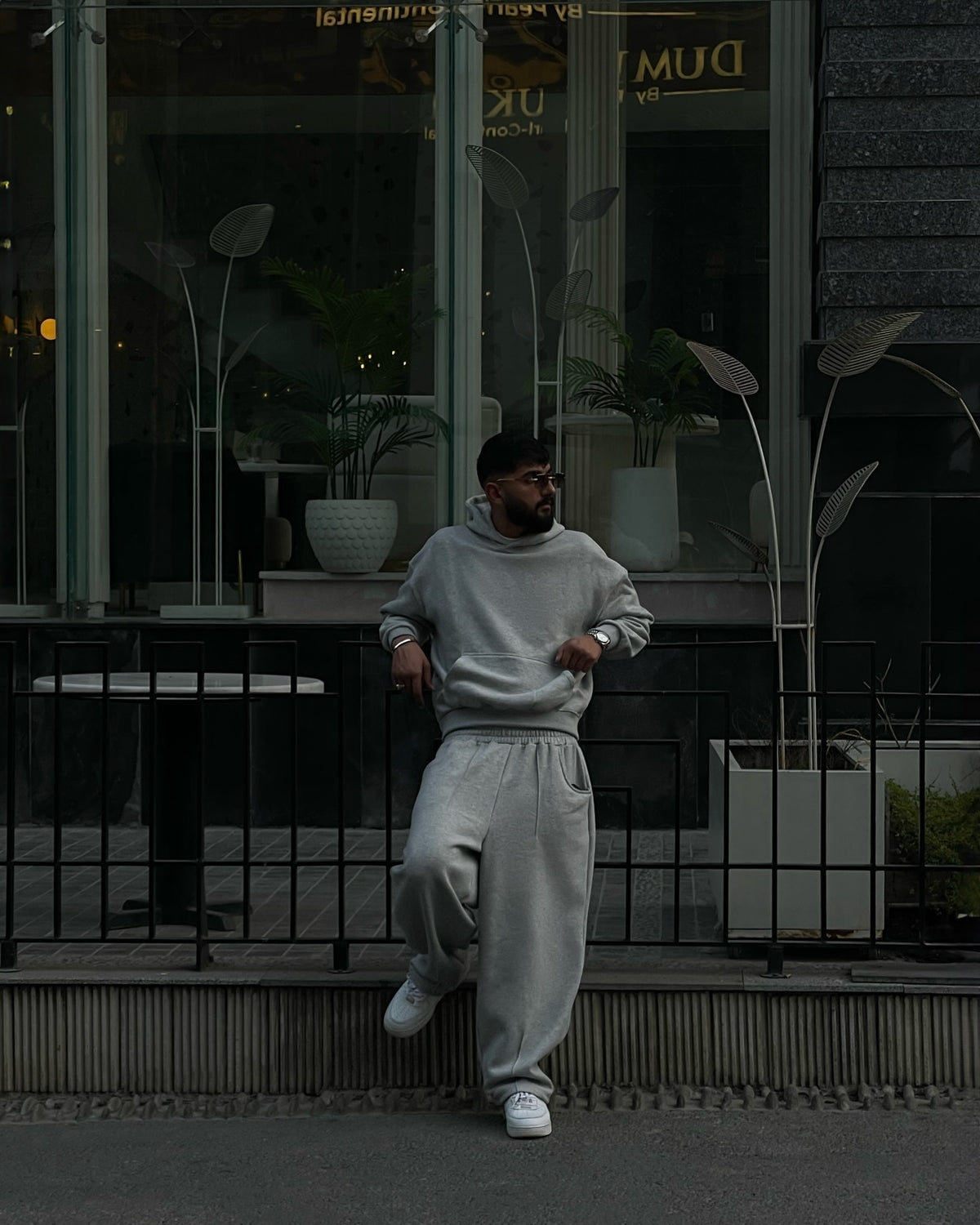 Elvaans Comfy grey hoodie worn at cafe